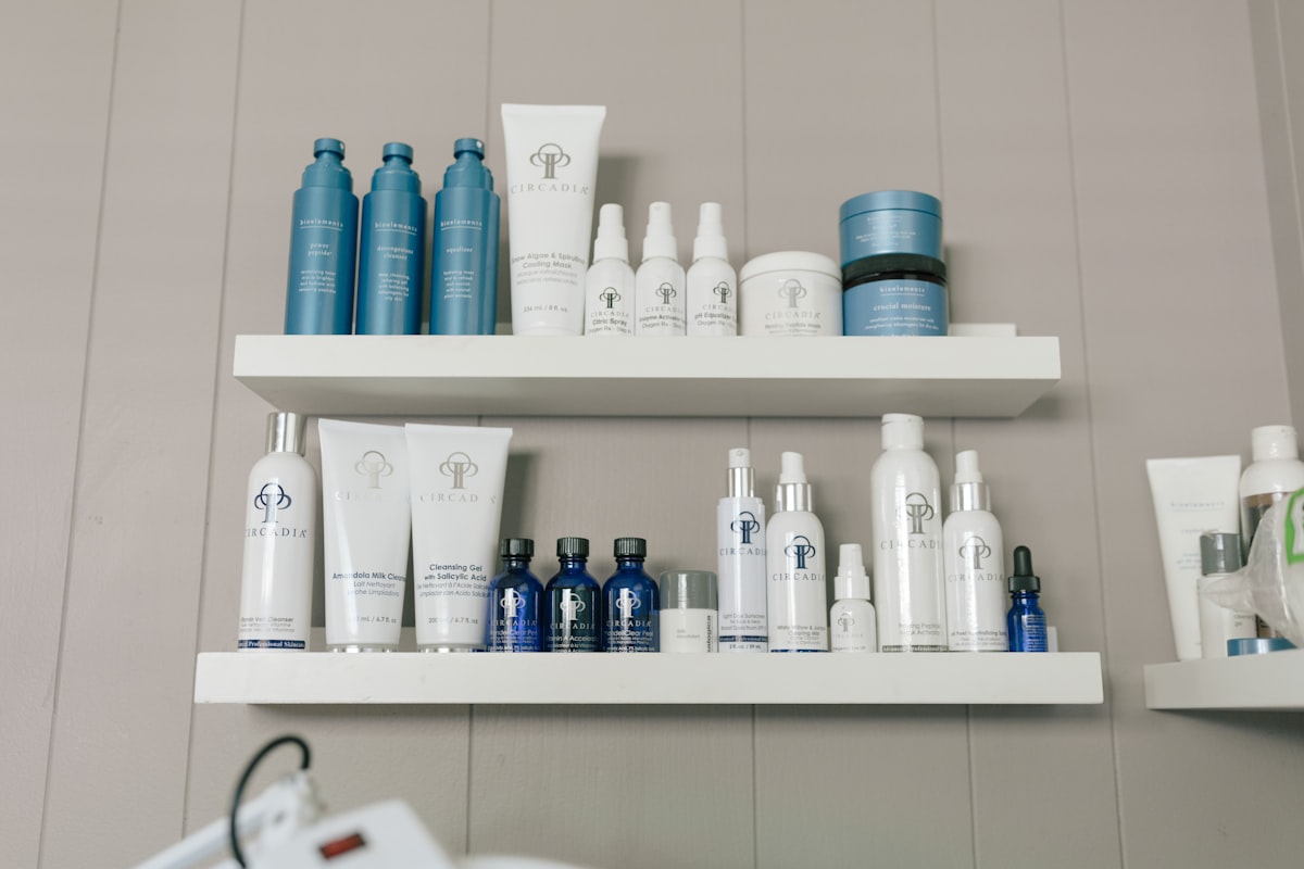 Shelves of skincare bottles and jars, each with a printed premium brand label